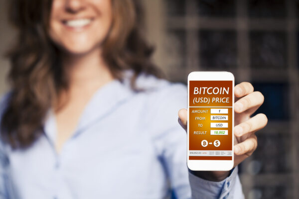 Bitcoin - Dollar converter app in a mobile phone screen.
